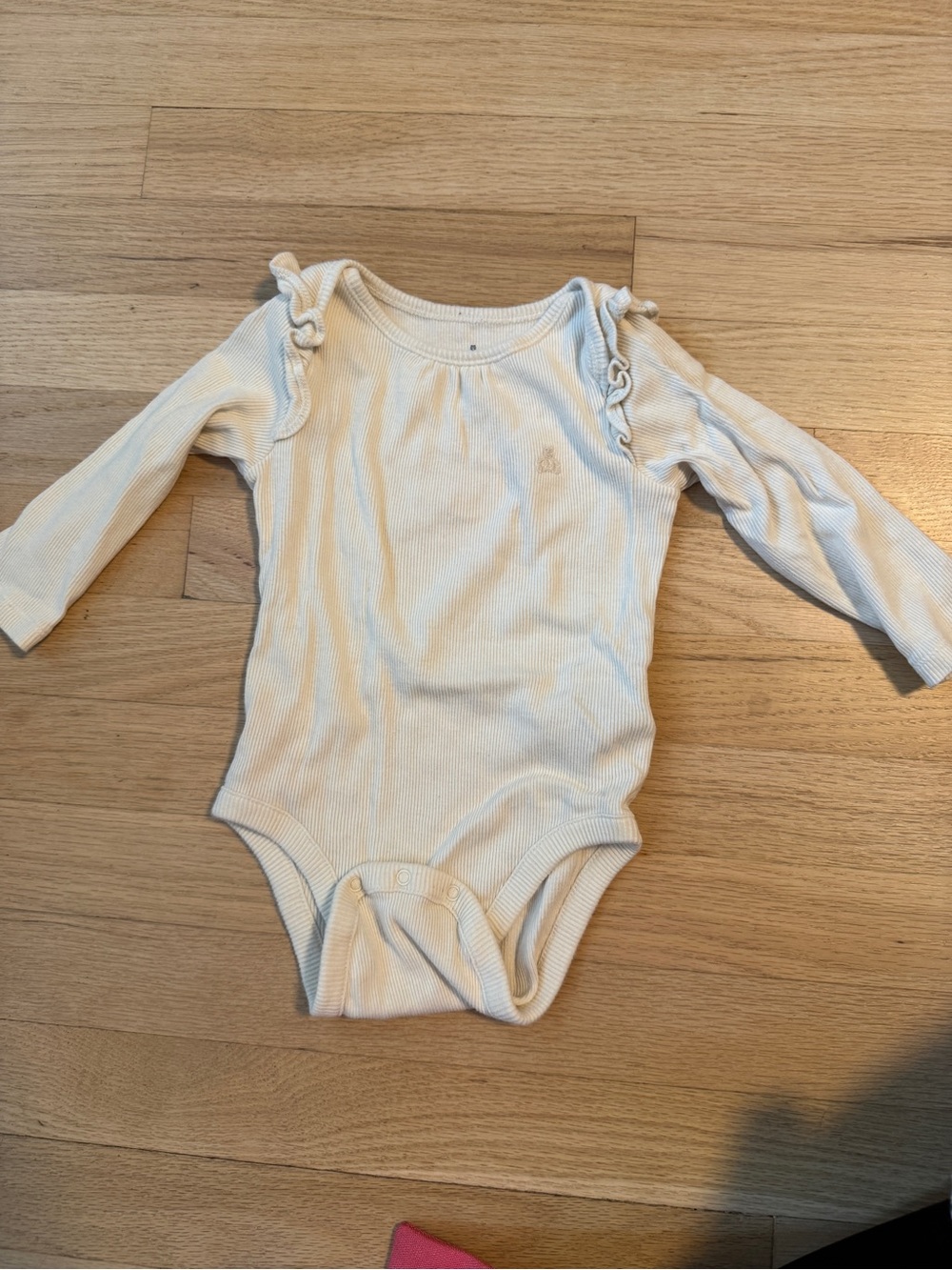 GAP Cream Ribbed Long-Sleeve Baby Bodysuit with Shoulder Ruffles